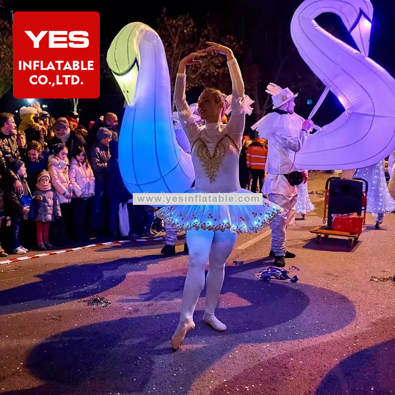 parade decorated event LED lighted swans representation inflatables costumes