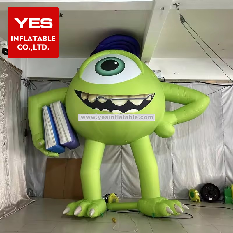 New Design Big Head Single Eye Inflatable Cartoon Model Green Inflatable Monster With Book